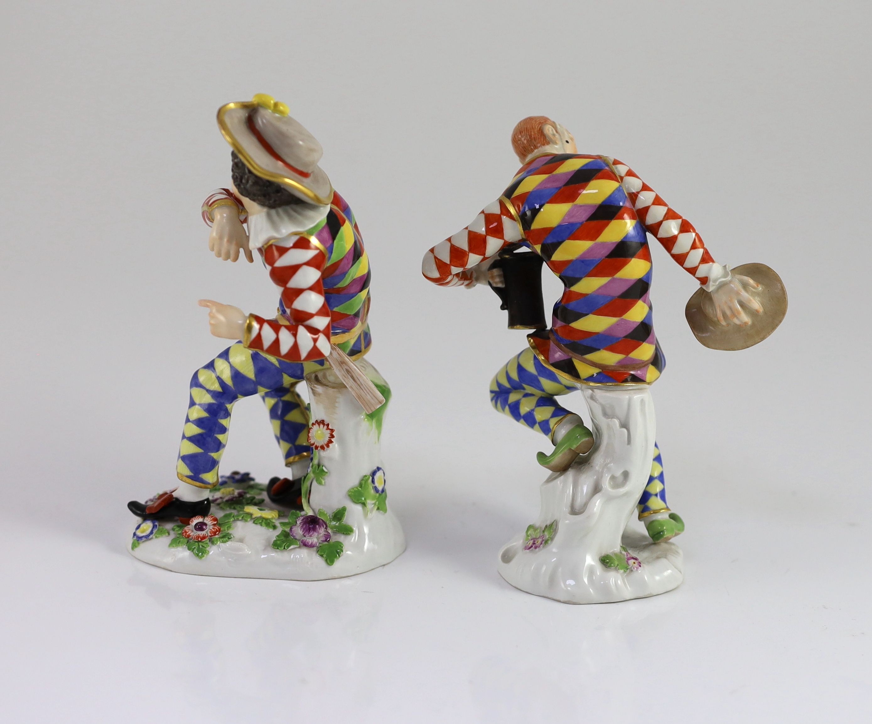 Two Meissen models of Harlequin, early to late 20th century, 15 and 16cm, One left index finger restored